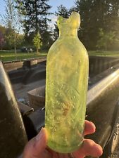 Peter Rice Paterson NJ light green Hutchinson embossed slug plate bottle picture